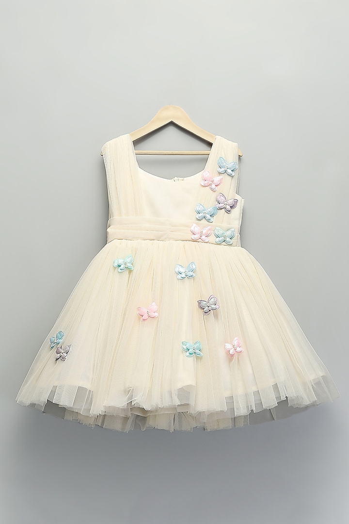 Off-White Soft Net Ruffled Dress For Girls by The little tales at Pernia's Pop Up Shop