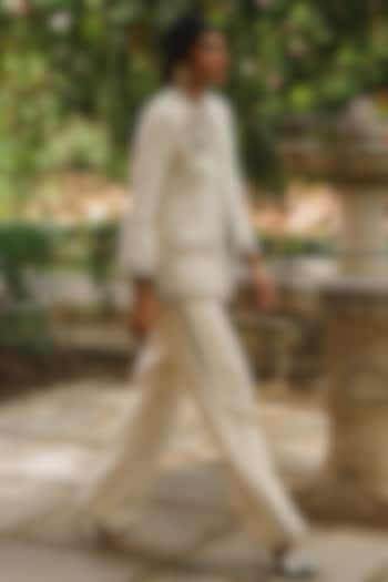 Ivory Textured Cotton Embroidered Pants by talitha at Pernia's Pop Up Shop