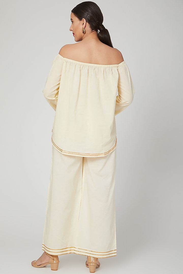 Beige Gota Embroidered Pants by THE LABEL UNTOLD at Pernia's Pop Up Shop