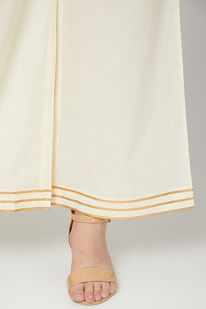 Beige Gota Embroidered Pants by THE LABEL UNTOLD at Pernia's Pop Up Shop