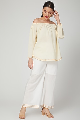 White Gota Embroidered Palazzo Pants by THE LABEL UNTOLD