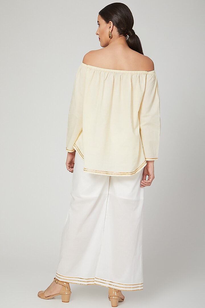 White Gota Embroidered Palazzo Pants by THE LABEL UNTOLD at Pernia's Pop Up Shop