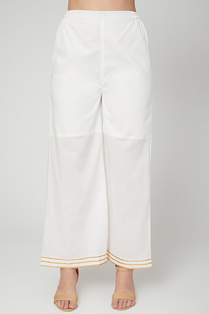 White Gota Embroidered Palazzo Pants by THE LABEL UNTOLD at Pernia's Pop Up Shop