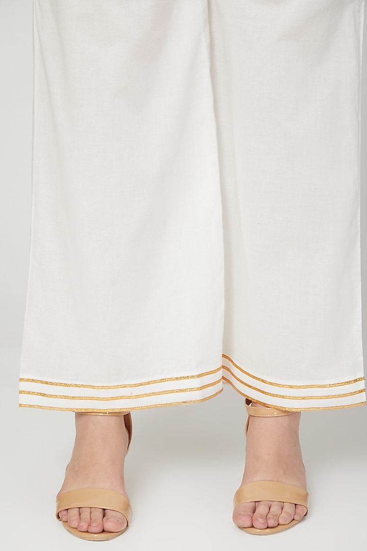 White Gota Embroidered Palazzo Pants by THE LABEL UNTOLD at Pernia's Pop Up Shop