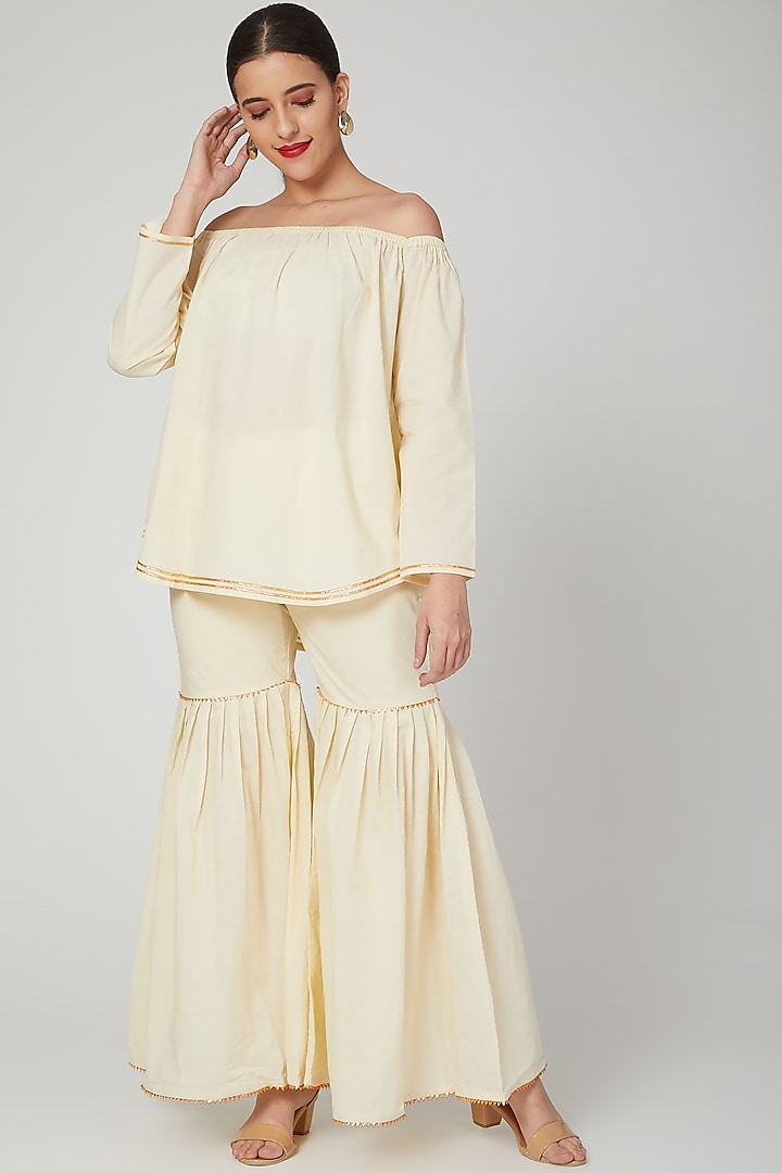 Beige Embroidered Off Shoulder Top by THE LABEL UNTOLD
