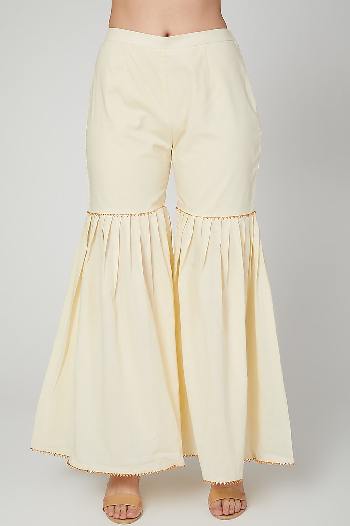 Beige Embroidered Off Shoulder Top by THE LABEL UNTOLD at Pernia's Pop Up Shop