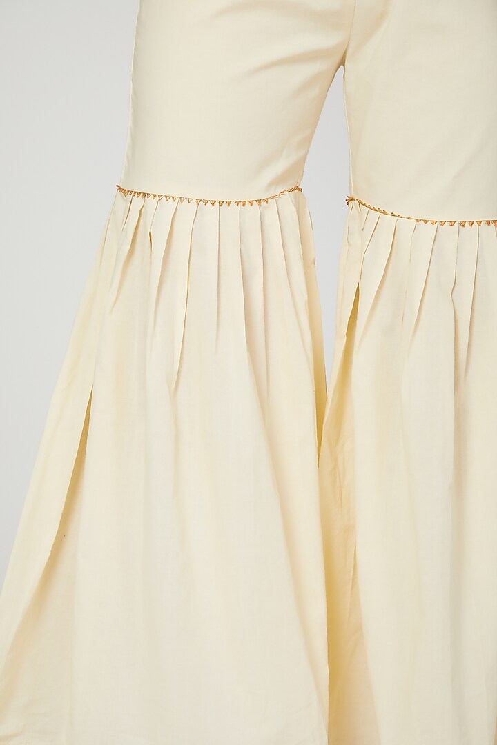 Beige Embroidered Off Shoulder Top by THE LABEL UNTOLD at Pernia's Pop Up Shop