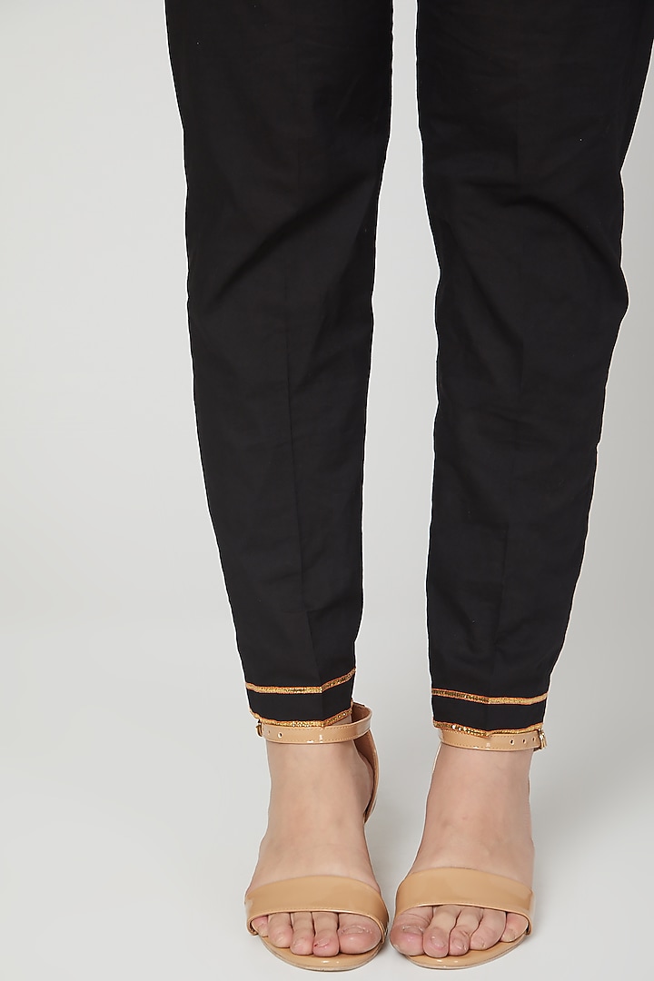 Black Embroidered Narrow Pants by THE LABEL UNTOLD at Pernia's Pop Up Shop