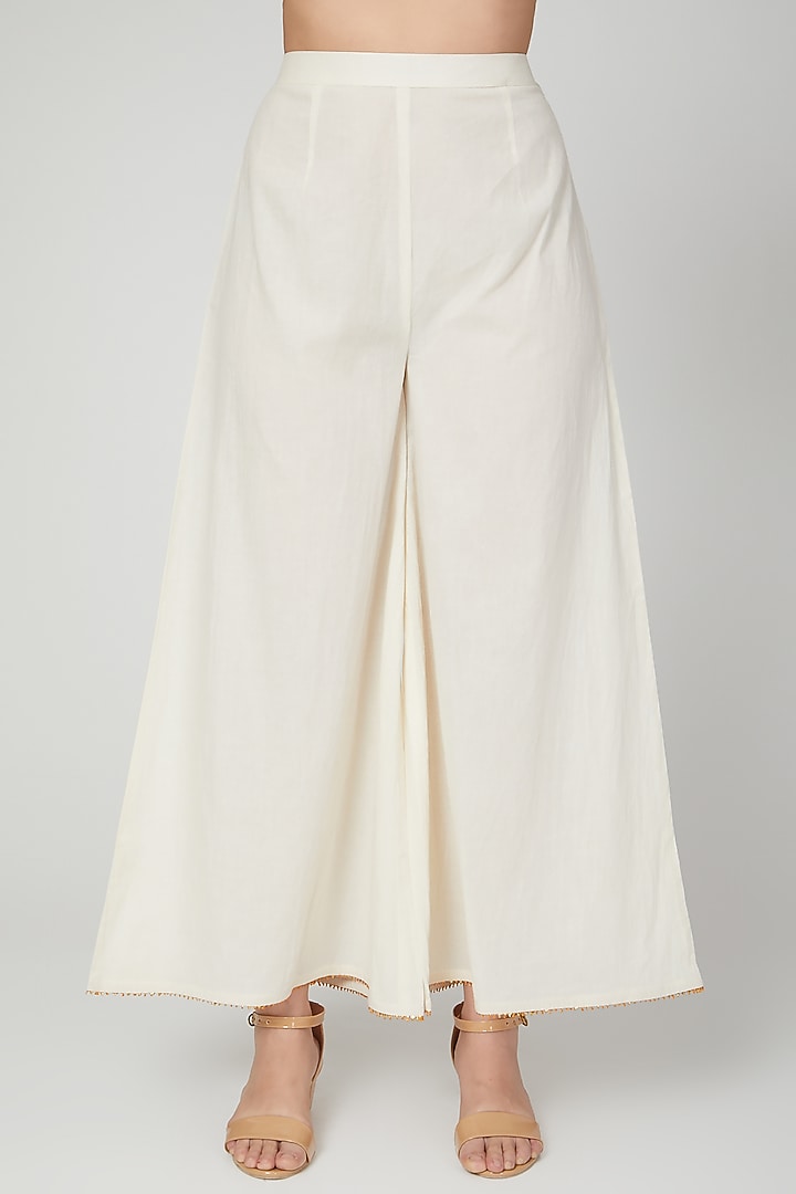 Beige Embroidered Palazzo Pants by THE LABEL UNTOLD at Pernia's Pop Up Shop