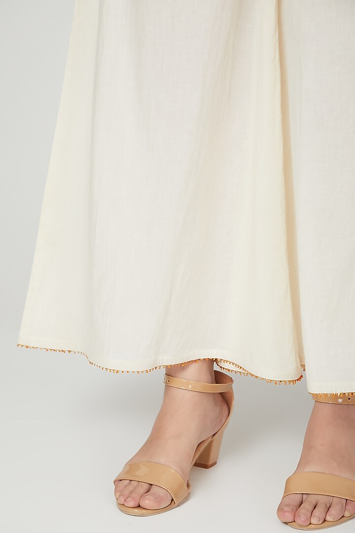 Beige Embroidered Palazzo Pants by THE LABEL UNTOLD at Pernia's Pop Up Shop