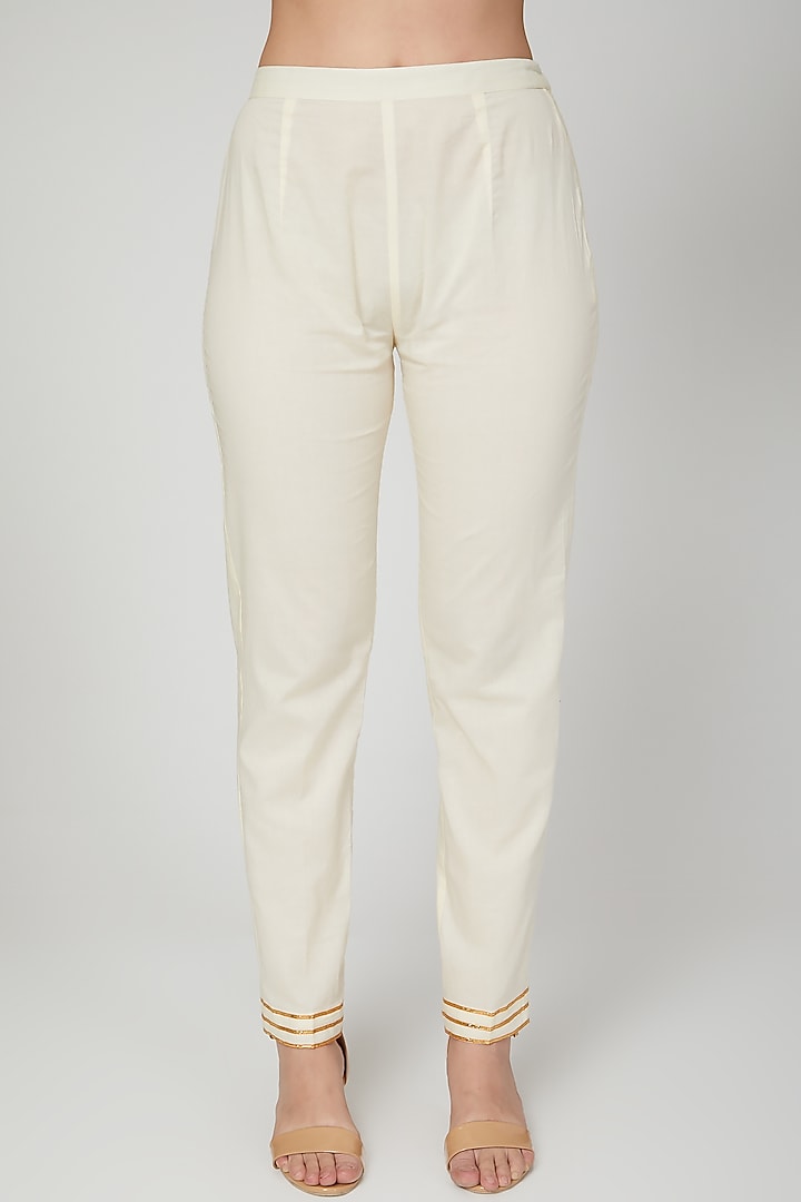 Beige Embroidered Narrow Pants by THE LABEL UNTOLD at Pernia's Pop Up Shop