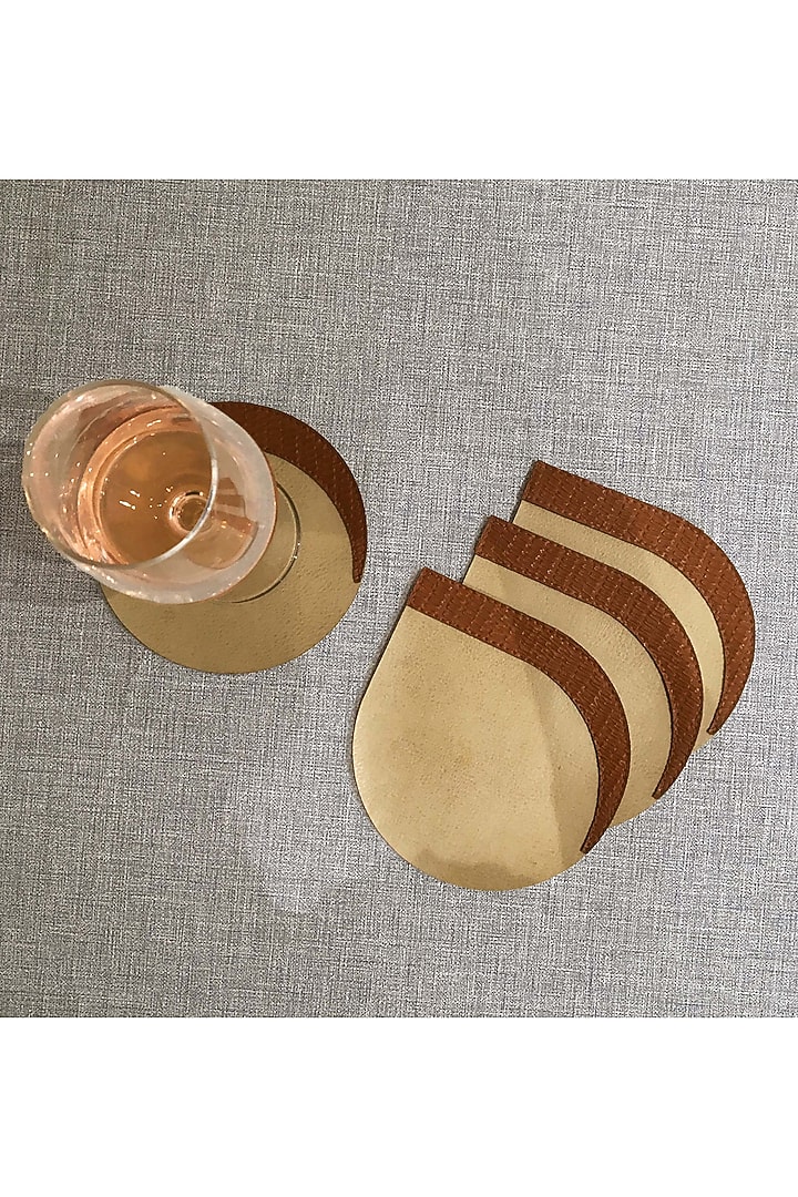 Beige & Tan Orange Leatherette Coasters by The Luxury Store at Pernia's Pop Up Shop