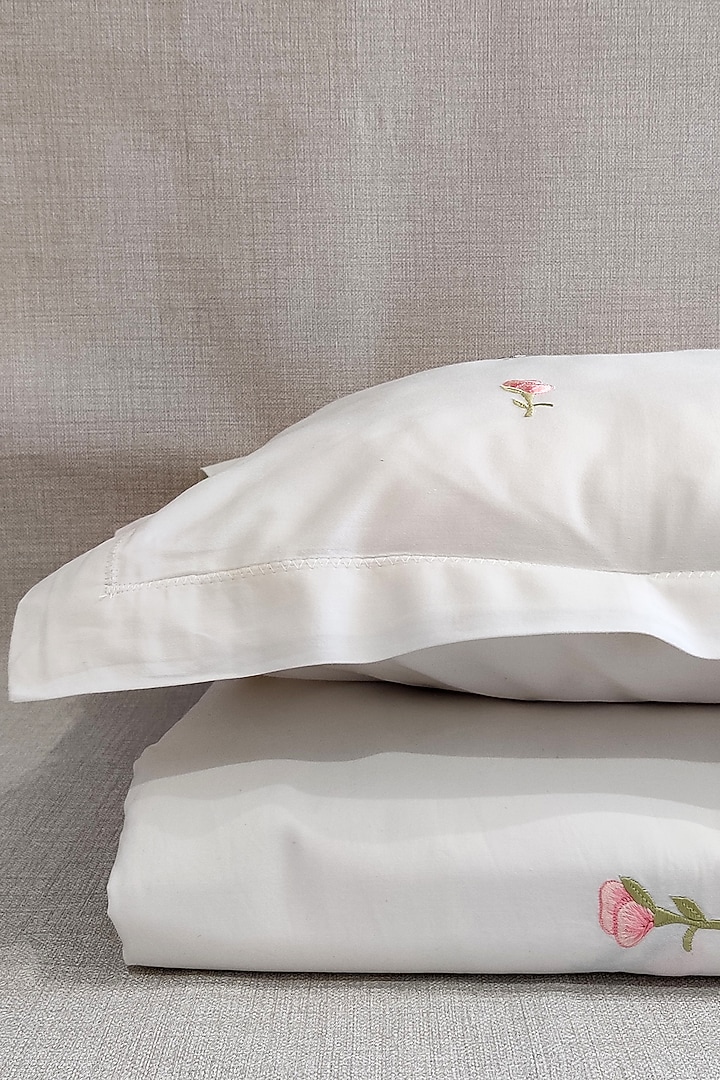 Off-White & French Pink Floral Embroidered Bedsheet Set by The Luxury Store at Pernia's Pop Up Shop
