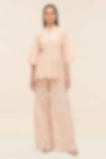 Coral Peach Schiffli Hand Embroidered Flared Pants by Taangerine Tiger at Pernia's Pop Up Shop