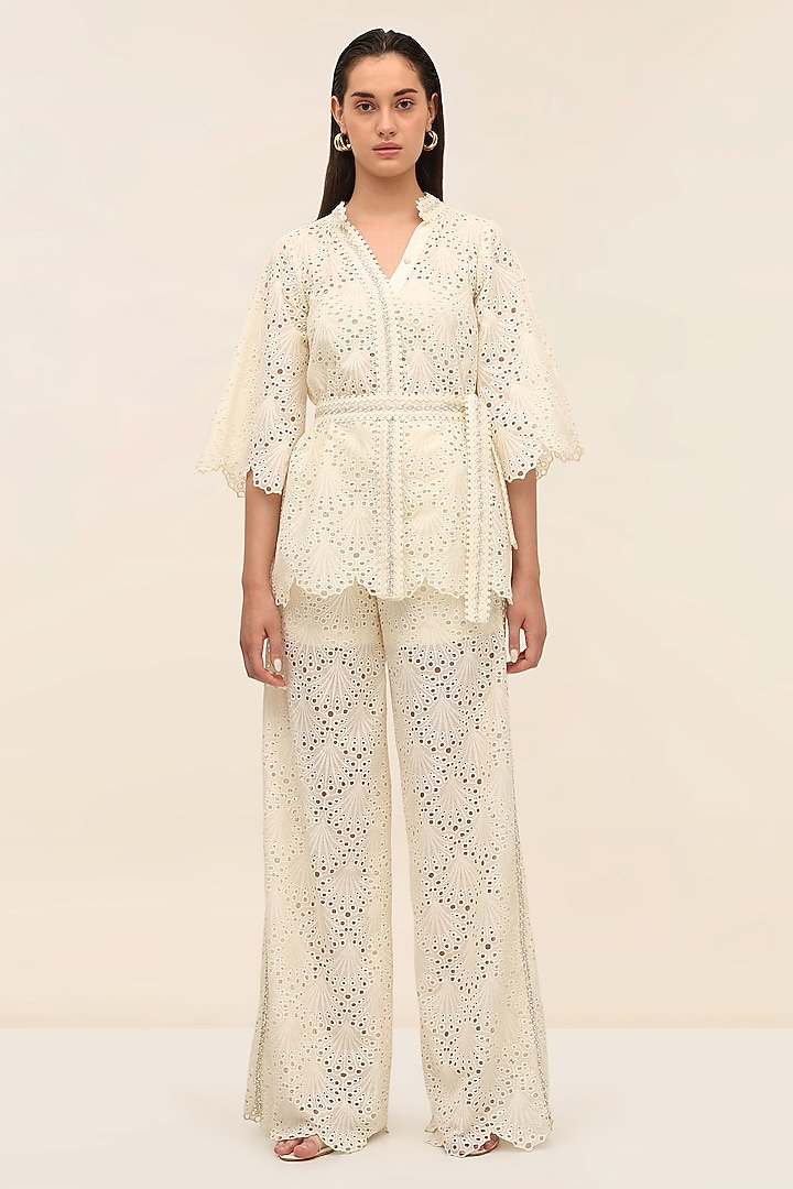 Ivory Schiffli Hand Embroidered Flared Pants by TANGERINE at Pernia's Pop Up Shop