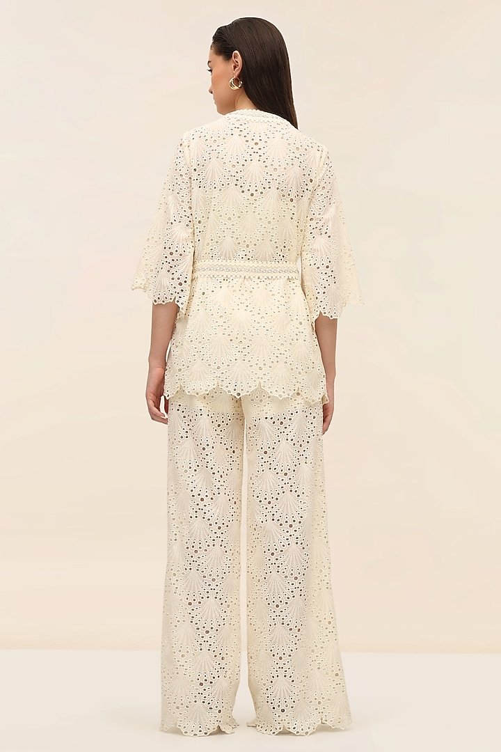 Ivory Schiffli Hand Embroidered Flared Pants by TANGERINE at Pernia's Pop Up Shop
