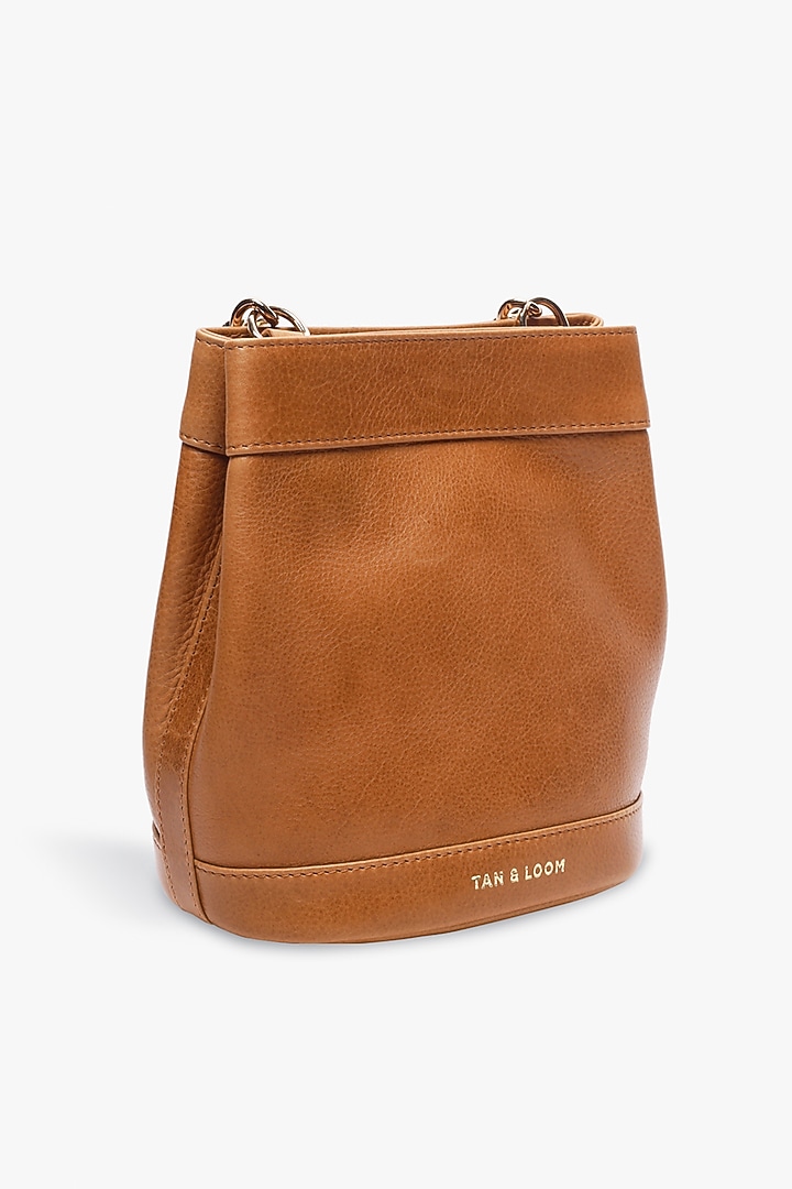Tan Leather Batua Bag by Tan and Loom at Pernia's Pop Up Shop