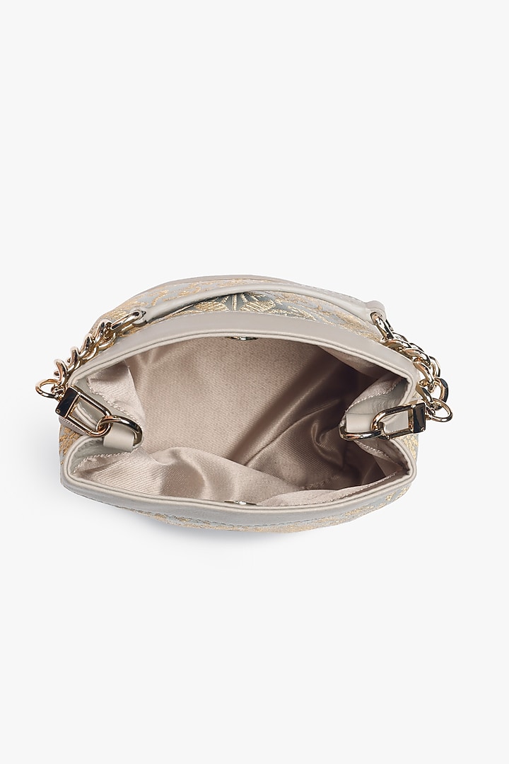 Misty Mint Leather & Brocade Batua Bag by Tan and Loom at Pernia's Pop Up Shop