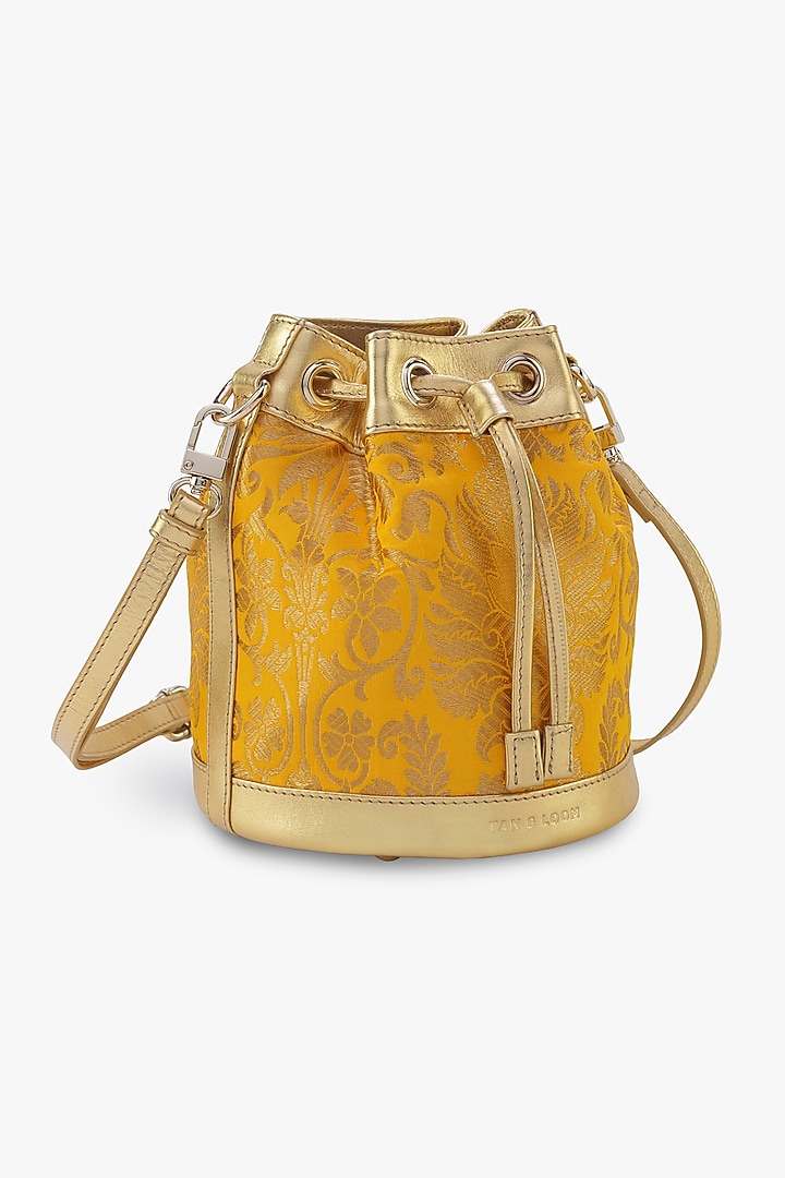 Yellow Genuine Leather & Banarasi Brocade Bucket Bag by Tan and Loom at Pernia's Pop Up Shop