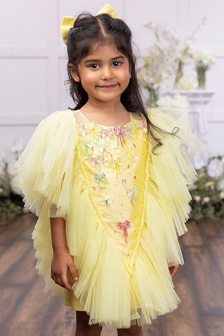 Yellow Burberry Silk & Tulle Net Hand Embellished Dress For Girls by TAMASHA at Pernia's Pop Up Shop