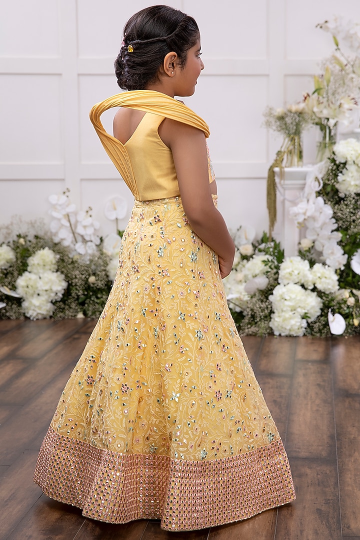Yellow Net Embroidered Lehenga Set For Girls by TAMASHA at Pernia's Pop Up Shop