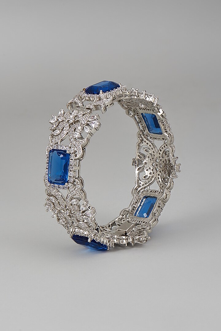 White Rhodium Finish Blue & White Sapphire Bracelet In Sterling Silver by Tanzila Rab at Pernia's Pop Up Shop