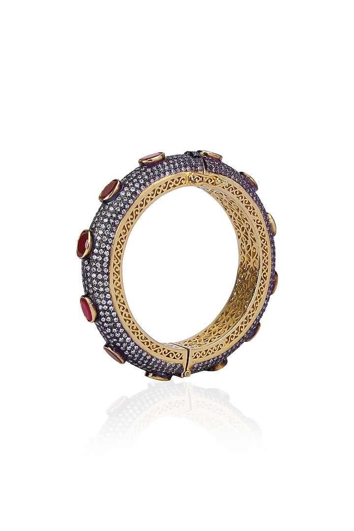 Tanzilla presents Oxidised gold finish sapphires and oval rubies bangle available only at Pernia's Pop Up Shop.