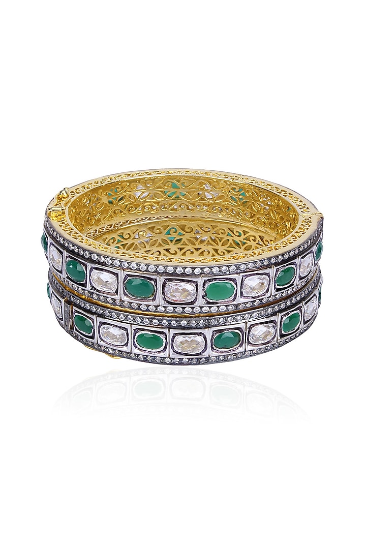 Tanzilla presents Set of Rhodium finish emerald and white sapphire bangles available only at Pernia's Pop Up.
