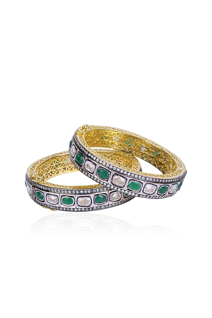 Tanzilla presents Set of Rhodium finish emerald and white sapphire bangles available only at Pernia's Pop Up.
