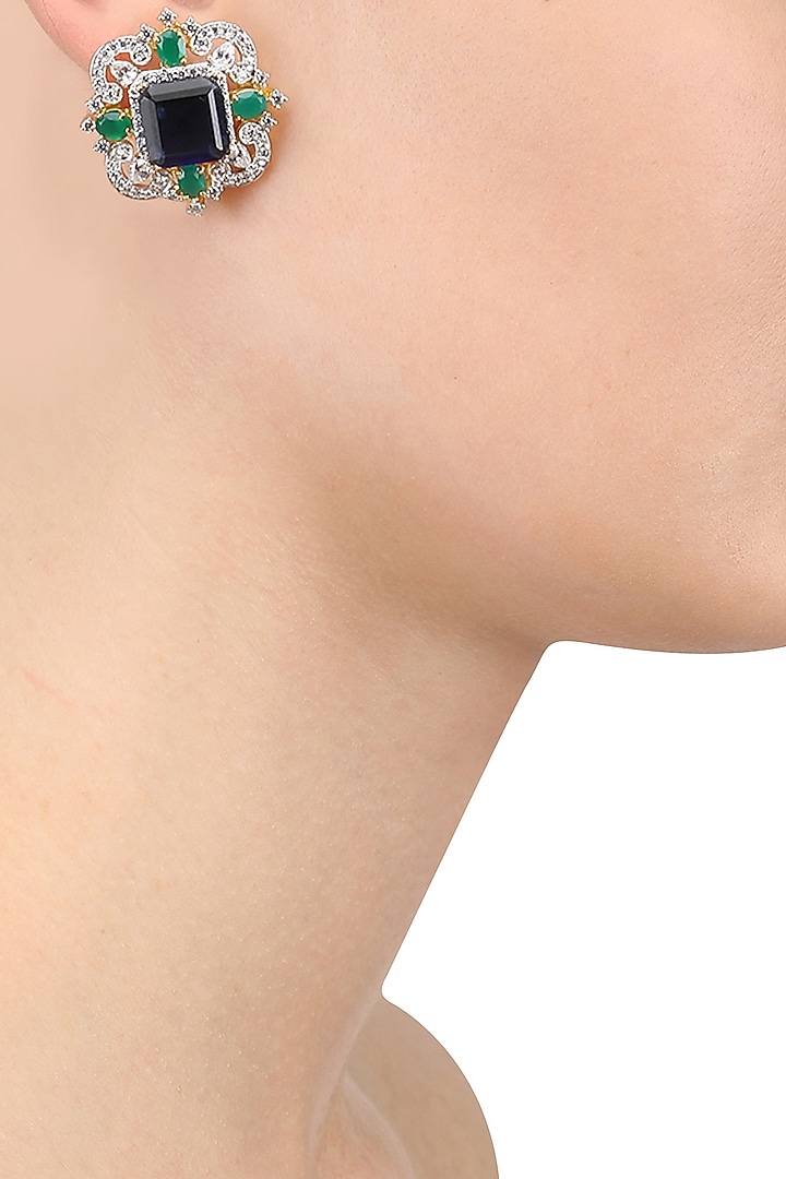 Tanzila Rab presents Gold finish emerald, blue and white sapphire ear studs available only at Pernia's Pop Up Shop.