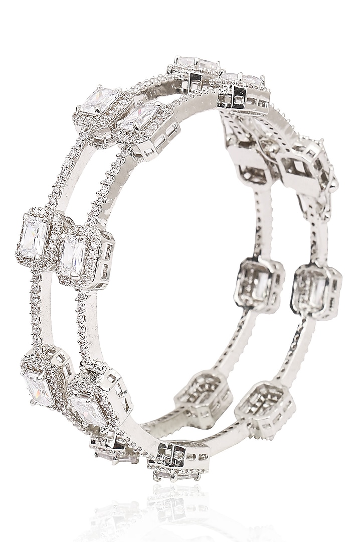 Tanzila Rab presents Set of 2 Rhodium finish emerald and white sapphire bangles available only at Pernia's Pop Up Shop.