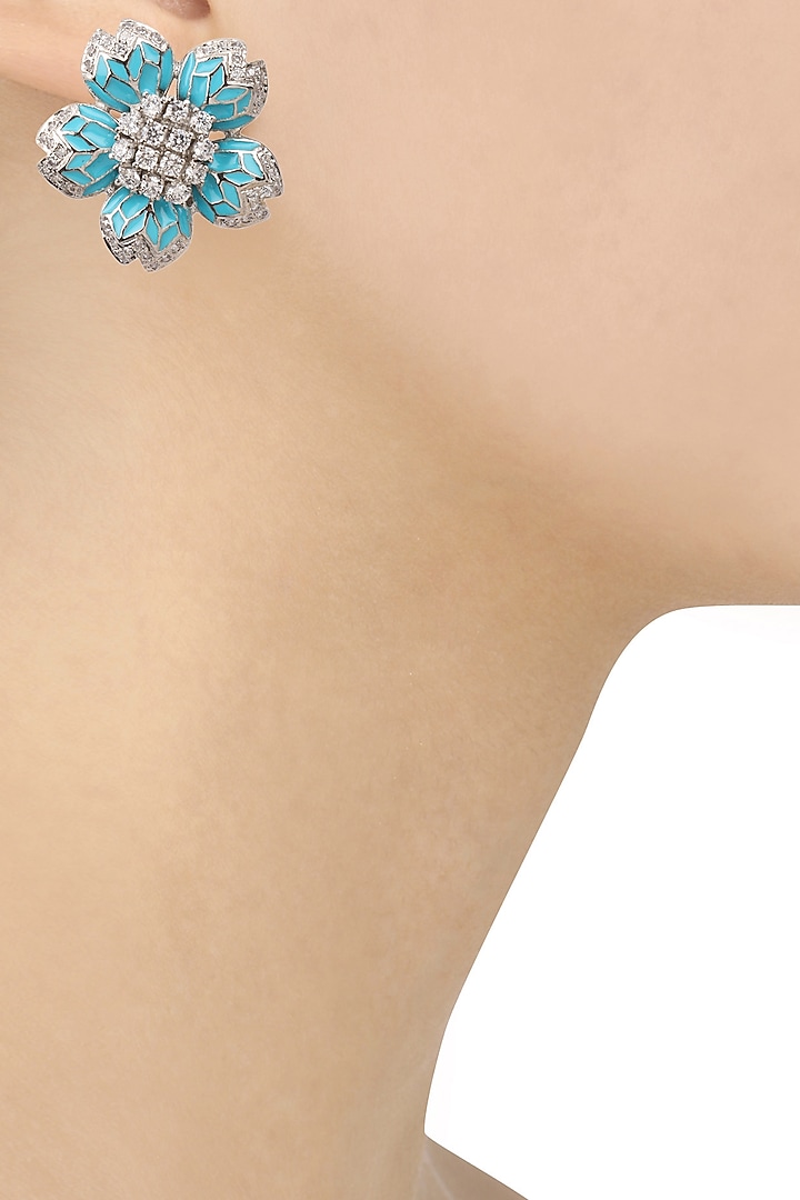 Tanzila Rab presents Rhodium finish turquoise enamel white sapphire earrings available only at Pernia's Pop Up Shop.