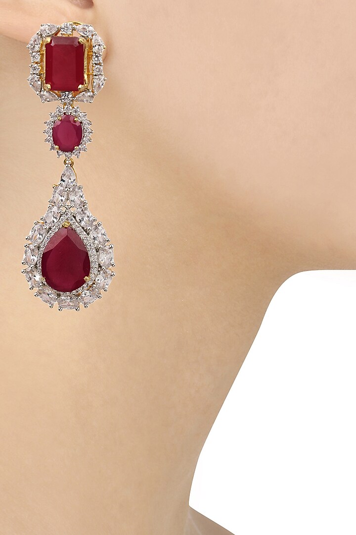Tanzila Rab presents Gold finish ruby and white sapphire cocktail earrings available only at Pernia's Pop Up Shop.