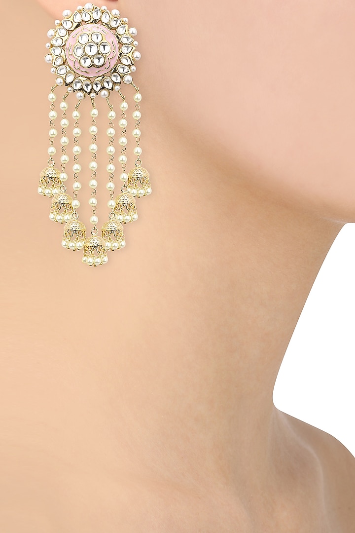 22k gold finish kundan and pink enamel bridal earrings available only at Pernia's Pop Up Shop.