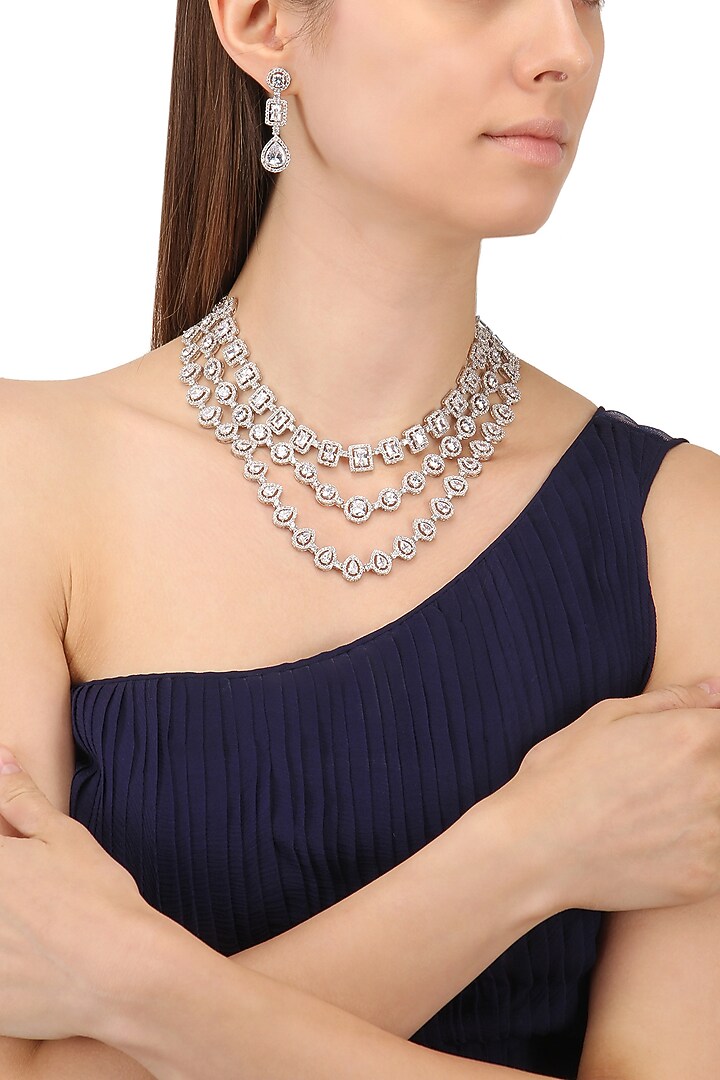 Rhodium finish white sapphire three line necklace available only at Pernia's Pop Up Shop.