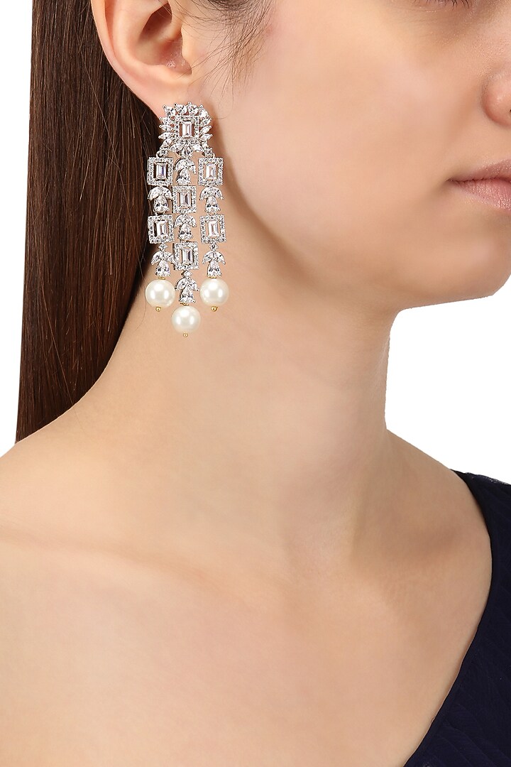 Rhodium finish white sapphire and pearl drops earrings available only at Pernia's Pop Up Shop.