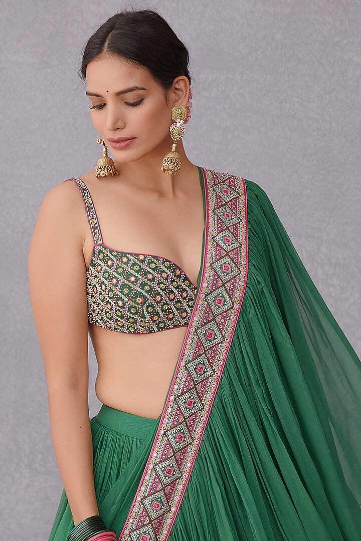 Emerald Green Embroidered Ruffled Wedding Saree by TORANI at Pernia's Pop Up Shop