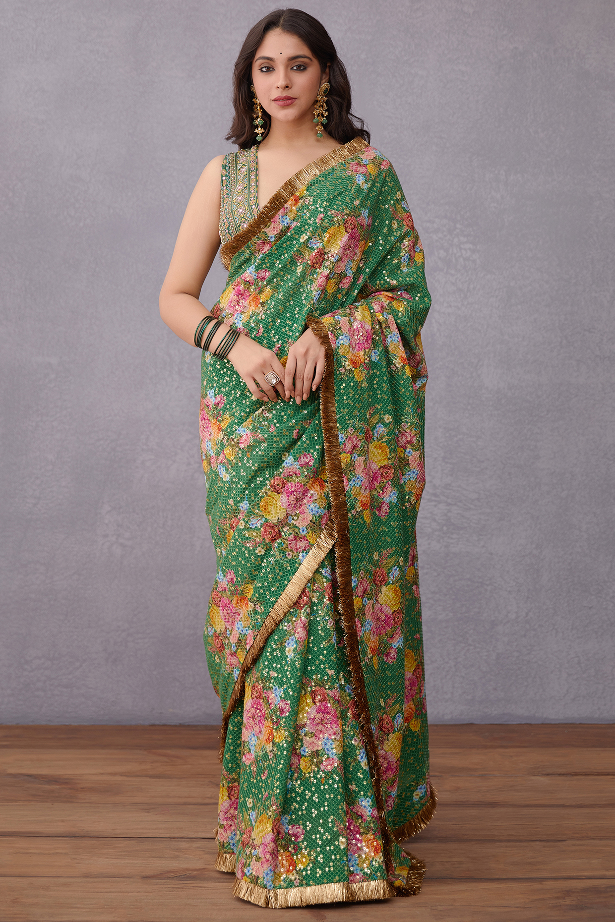 Emerald Green Georgette Printed & Embroidered Saree by TORANI