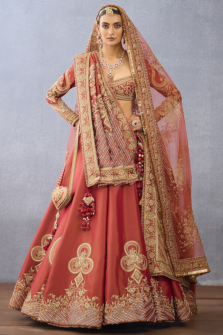Rust Tissue & Net Embroidered Bridal Lehenga Set by TORANI at Pernia's Pop Up Shop
