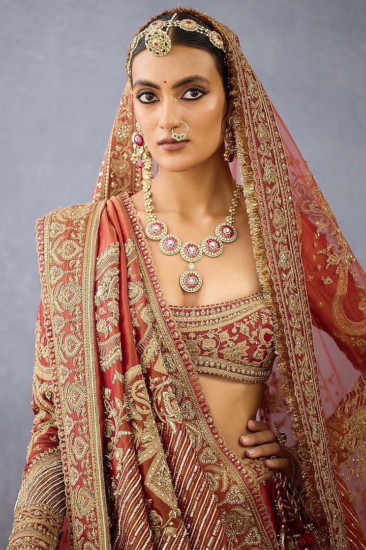 Rust Tissue & Net Embroidered Bridal Lehenga Set by TORANI at Pernia's Pop Up Shop