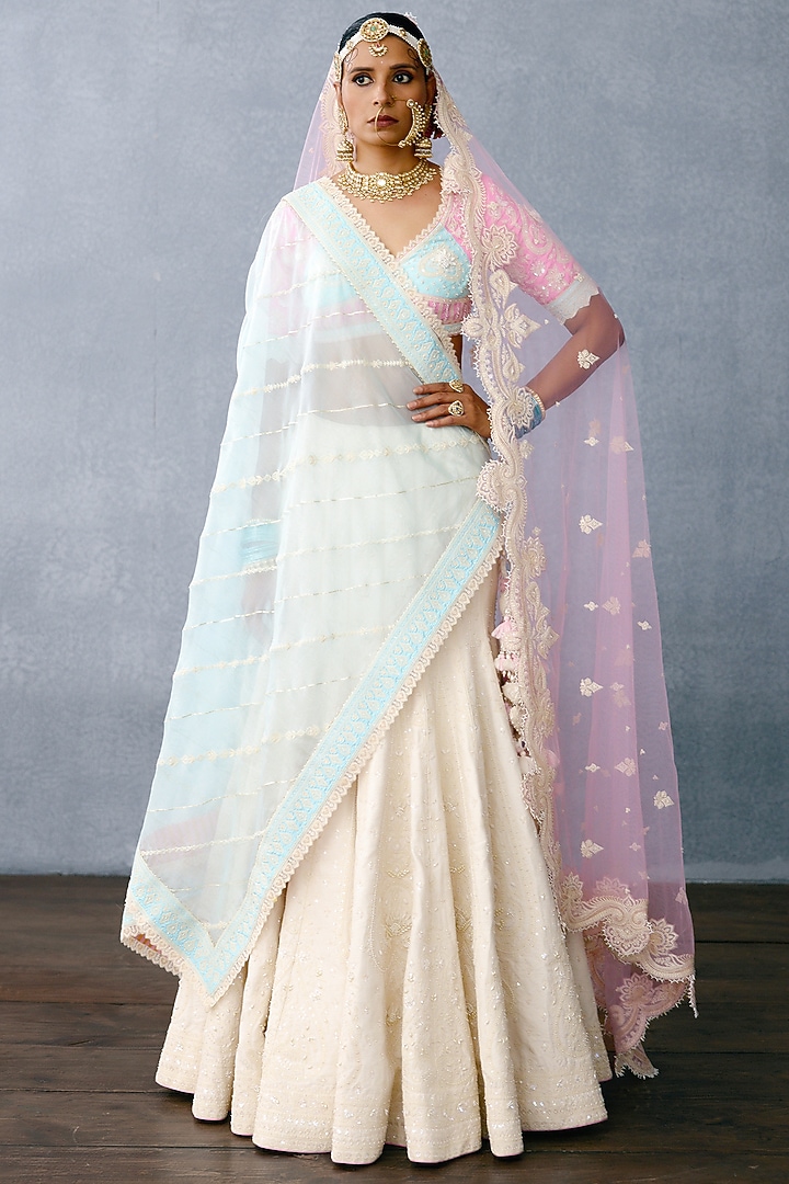 Ivory Jeni Silk & Organza Embroidered Bridal Lehenga Set by TORANI at Pernia's Pop Up Shop