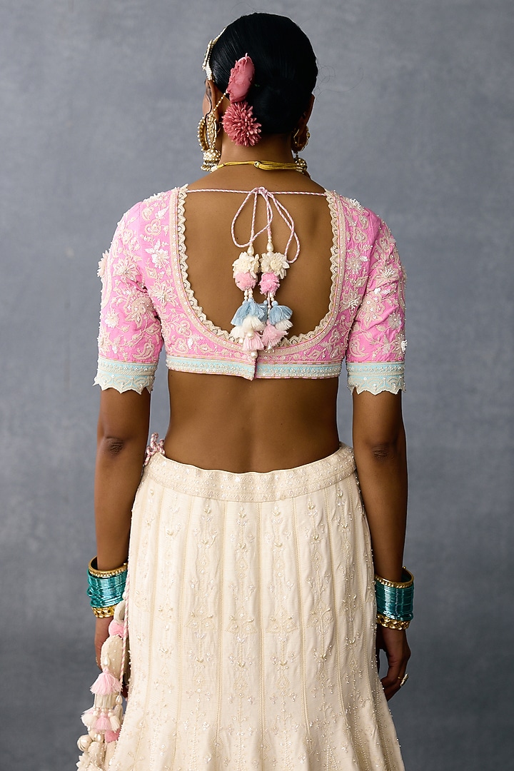 Ivory Jeni Silk & Organza Embroidered Bridal Lehenga Set by TORANI at Pernia's Pop Up Shop