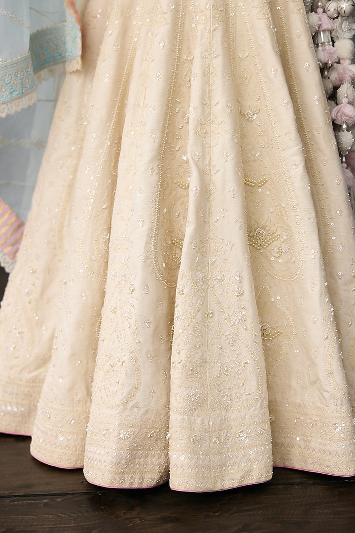 Ivory Jeni Silk & Organza Embroidered Bridal Lehenga Set by TORANI at Pernia's Pop Up Shop