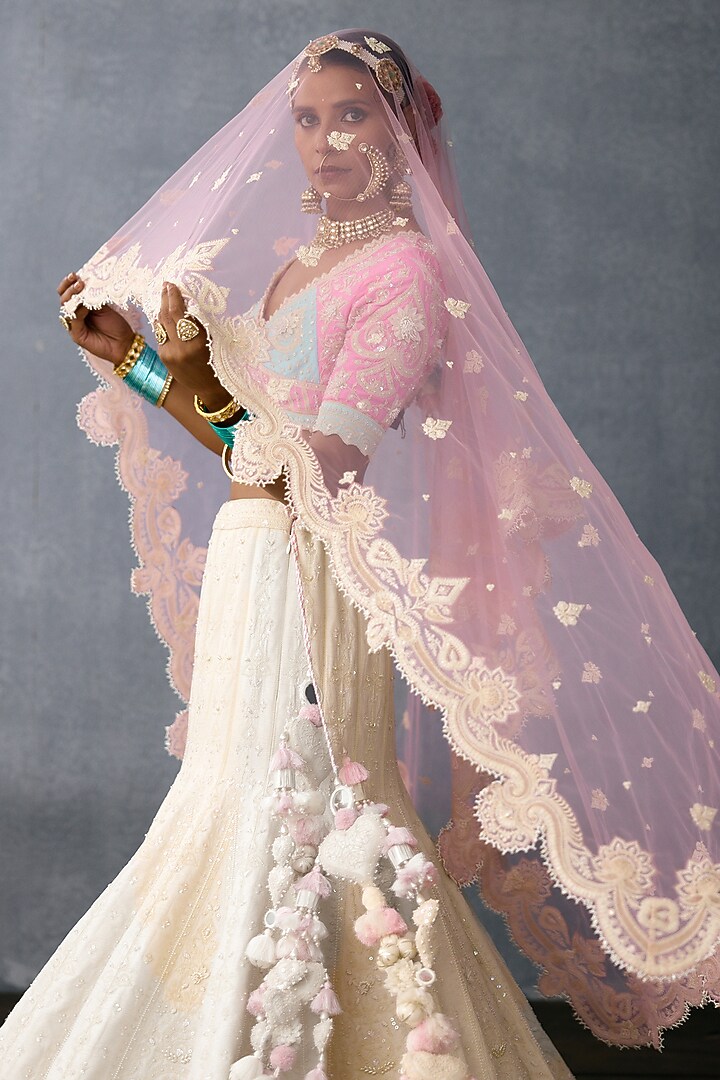 Ivory Jeni Silk & Organza Embroidered Bridal Lehenga Set by TORANI at Pernia's Pop Up Shop