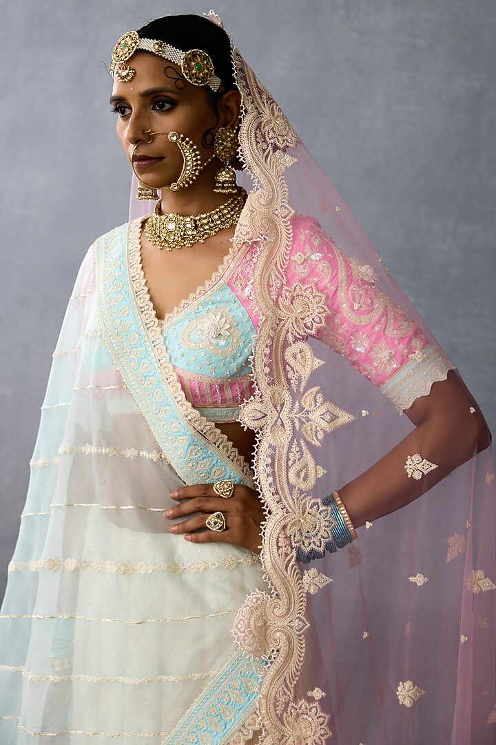 Ivory Jeni Silk & Organza Embroidered Bridal Lehenga Set by TORANI at Pernia's Pop Up Shop