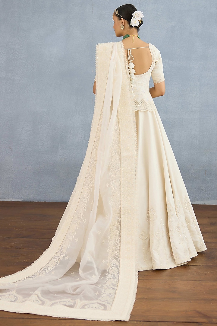 Ivory Jeni Silk & Organza Embroidered Bridal Lehenga Set by TORANI at Pernia's Pop Up Shop