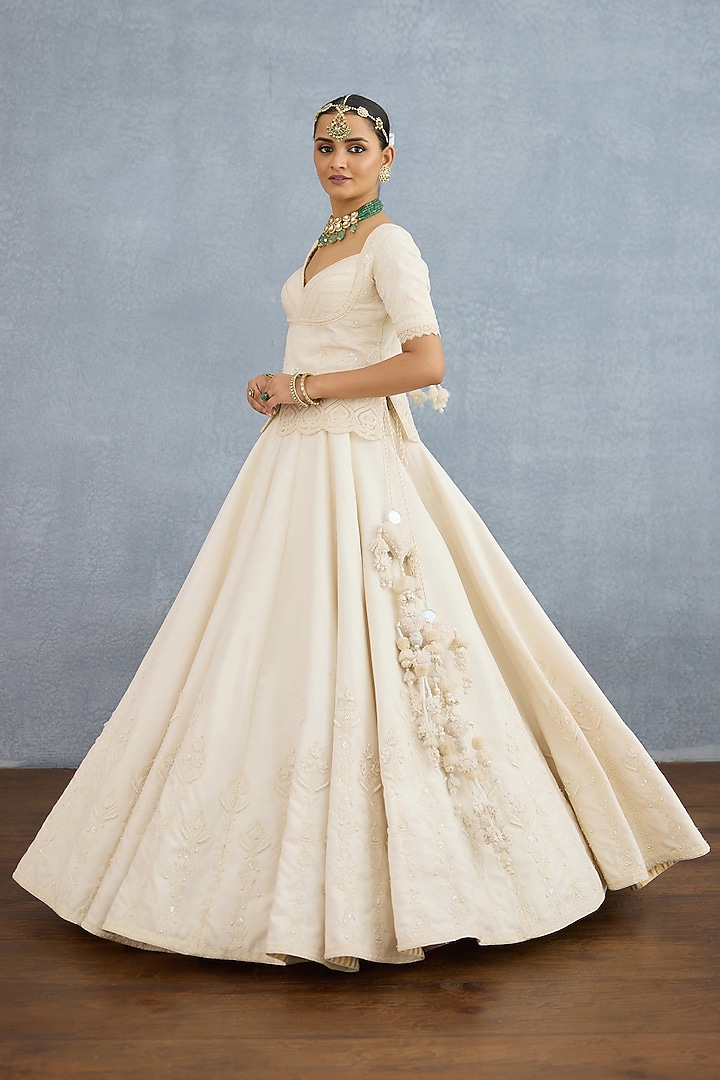 Ivory Jeni Silk & Organza Embroidered Bridal Lehenga Set by TORANI at Pernia's Pop Up Shop