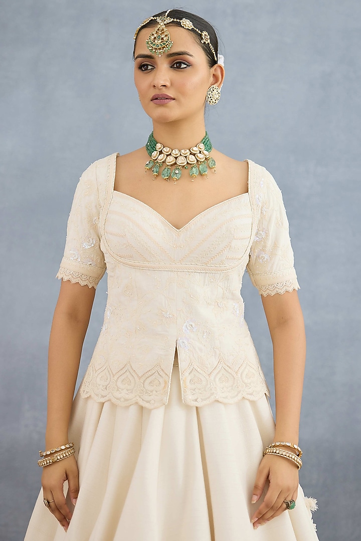 Ivory Jeni Silk & Organza Embroidered Bridal Lehenga Set by TORANI at Pernia's Pop Up Shop