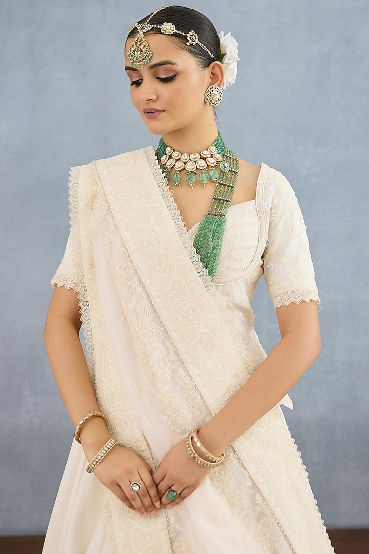 Ivory Jeni Silk & Organza Embroidered Bridal Lehenga Set by TORANI at Pernia's Pop Up Shop