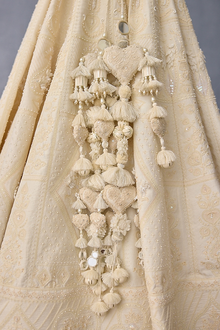 Ivory Jeni Silk & Organza Embroidered Bridal Lehenga Set by TORANI at Pernia's Pop Up Shop